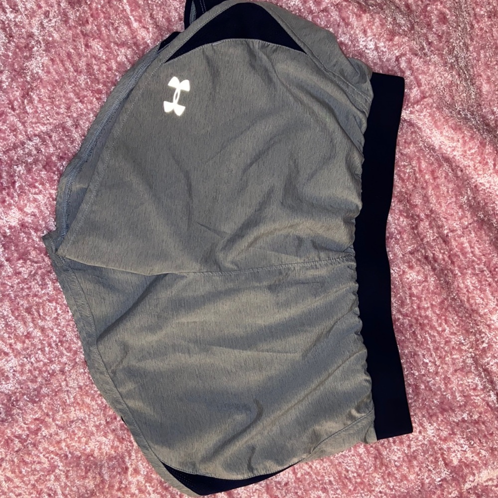 Under Armour gym shorts, builtin underwear. Size M